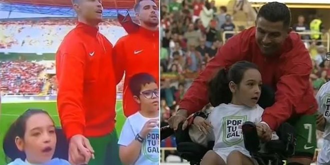 Engelli k�z�n sahaya girmesine yard�m eden Ronaldo, g�n�lleri fethetti