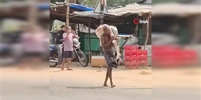 Para �ekmek i�in karde�inin iskeletiyle bankaya gitti