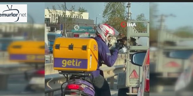 Kurye ile k�pek aras�nda y�rek �s�tan g�r�nt�