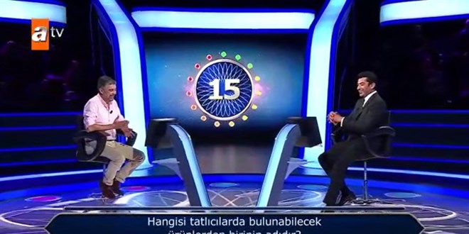 Kenan �mirzal�o�lu'nun ilk soruda elenen yar��mac�ya nasihati programa damga vurdu